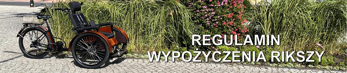 Regulamin wypożyczenia rikszy Riksza na tle zieleni w centrum miasta